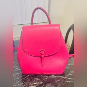 Selling this beautiful kate spade hot pink backpack. Never used,